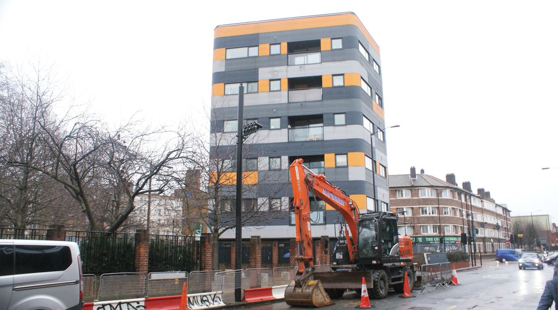A block of flats on a London street corner